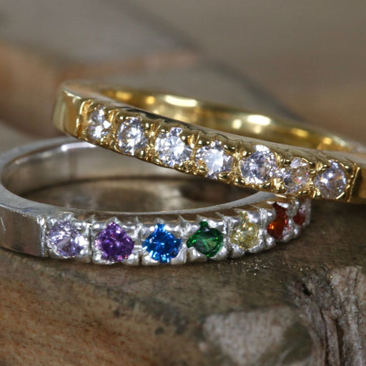 silver and gold bracelets design with different gems stones