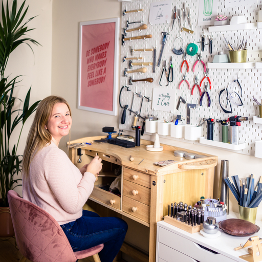 Girl-making-a-jewelry-with-smiling-face